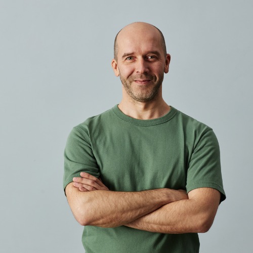 bald-man-smiling-at-camera-standing-with-arms-crossed.jpg_s=1024x1024&w=is&k=20&c=zvw6qDmYHmIvvCbEn2ZUF0tdSbKPnEWRsVAzd9g4hCM=